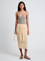 Proenza Schouler Front full length image of model wearing Phelan Knit Skirt in Linen Twist in Light Wheat