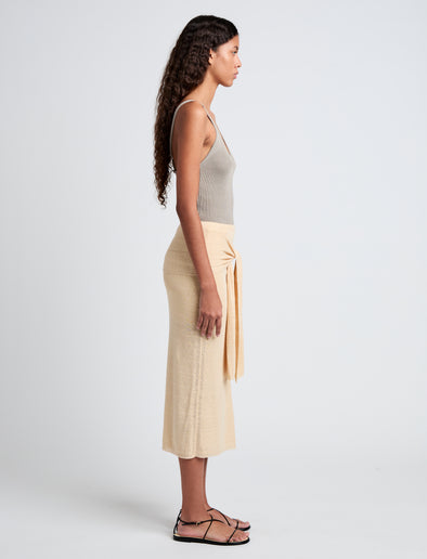 Proenza Schouler Side full length image of model wearing Phelan Knit Skirt in Linen Twist in Light Wheat