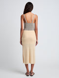 Proenza Schouler Back full length image of model wearing Phelan Knit Skirt in Linen Twist in Light Wheat