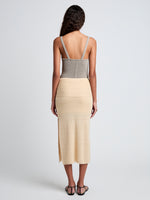Proenza Schouler Back full length image of model wearing Phelan Knit Skirt in Linen Twist in Light Wheat