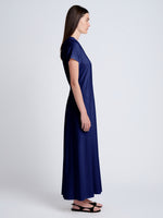 Proenza Schouler side image of model wearing Noelle Dress in Jersey in dark ink