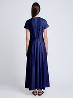 Proenza Schouler back image of model wearing Noelle Dress in Jersey in dark ink