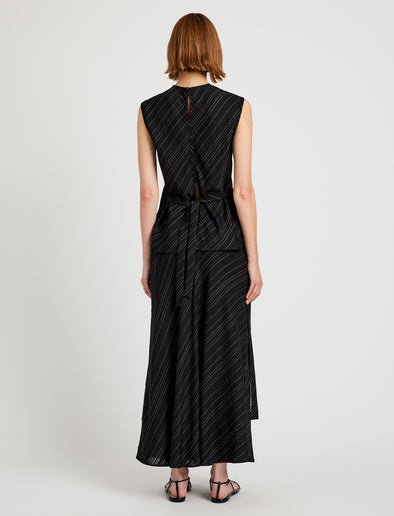 Proenza Schouler back image of model wearing Kaia Skirt in Woven Stripe Flou in black/chalk