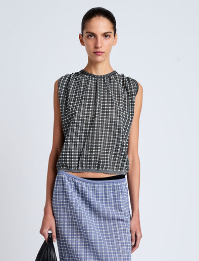 Proenza Schouler cropped front image of model wearing Bradley Crewneck in Plaid Knit in off white/black