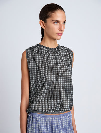 Proenza Schouler detail image of model wearing Bradley Crewneck in Plaid Knit in off white/black