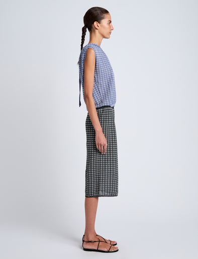 Proenza Schouler side image of model wearing Bradley Crewneck in Plaid Knit in off white/denim