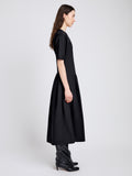 Proenza Schouler Side full length image of model wearing Ainsley Dress in Tech Cotton in Black