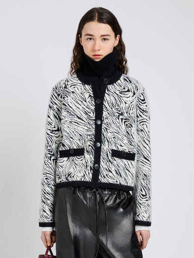 Proenza Schouler cropped image of model wearing Amina Jacket in Jacquard Alpaca in Black, white zebra