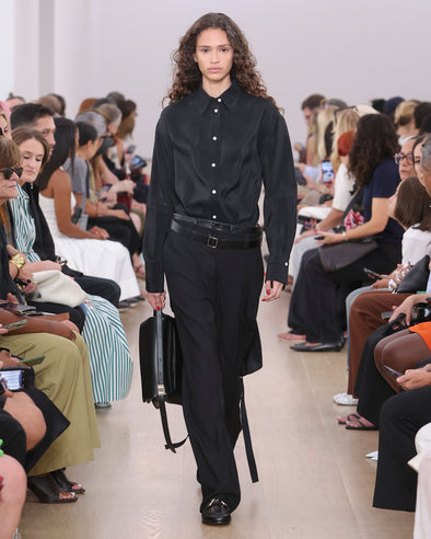 Runway image of model in Olympia Dress In Washed Habotai in black
