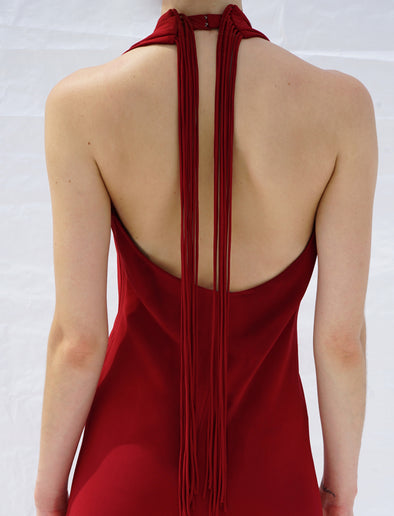 Proenza Schouler Detail cropped image of model wearing Ember Dress in Light Matte Viscose Crepe in RED