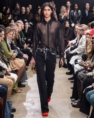 Image of model walking Proenza Schouler Fall Winter 2024 Runway wearing Ryman Jean in black multi