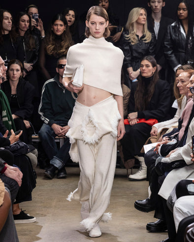 Image of model walking Proenza Schouler Fall Winter 2024 Runway wearing Shawl in Textured Knits in ivory
