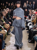 Model walking in Proenza Schouler Fall Winter 2024 Runway show wearing Toni Dress in Texture Knit in ash grey