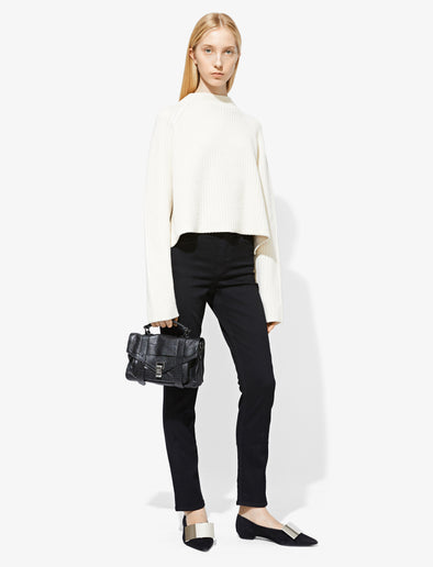 Image of model carrying PS1 Tiny Crossbody Bag in BLACK