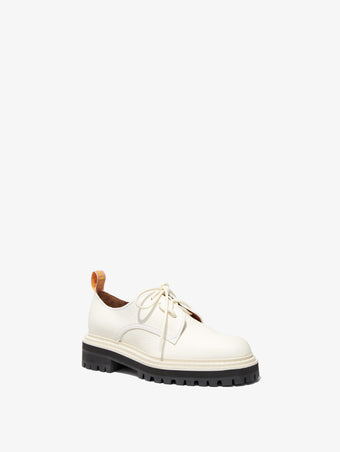 Front 3/4 image of Lug Sole Oxfords in white