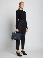 Image of model wearing PS1 Medium Bag in NAVY