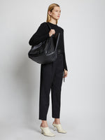 Image of model holding XL Ruched Tote in BLACK