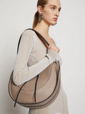 Image of model wearing Arch Shoulder Bag in LIGHT TAUPE.jpg