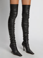 Image of model wearing Trap Over the Knee Boots in Black
