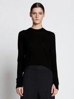 Front cropped image of model wearing Eco Superfine Merino Sweater in BLACK