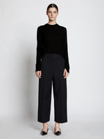 Front full length image of model wearing Eco Superfine Merino Sweater in BLACK
