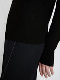 Detail image of model wearing Eco Superfine Merino Sweater in BLACK