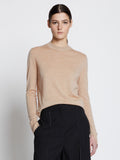 Front cropped image of model wearing Eco Superfine Merino Sweater in BEIGE
