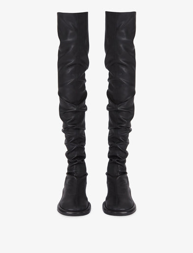 Front image of ruched thigh-high boots in Black