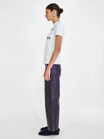 Side full length image of model wearing Logo T-Shirt in WHITE