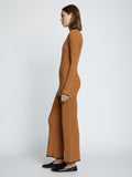 Side full length image of model wearing Fine Gauge Rib Knit Top in CHESTNUT/BLACK