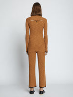 Back full length image of model wearing Fine Gauge Rib Knit Top in CHESTNUT/BLACK