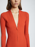 Detail image of model wearing Rib Knit Zip Cardigan Dress in BRIGHT ORANGE