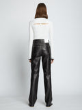 Back full length image of model wearing Leather Straight Pants in BLACK