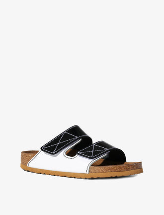 Proenza Schouler front 3/4 image of Arizona PS EXQ Berlin Birkenstock collaboration in White/Black