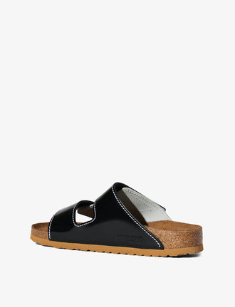 Proenza Schouler back 3/4 image of Arizona PS EXQ Berlin Birkenstock collaboration in White/Black