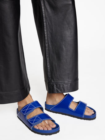 Proenza Schouler image of model wearing Birkenstock collaboration Arizona PS EXQ Berlin Cobalt in Cobalt