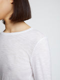 Back full length image of model wearing Solid Tissue Jersey Long Sleeve Tee in WHITE
