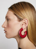 Image of model wearing LEATHER HOOP EARRINGS - FLAME RED