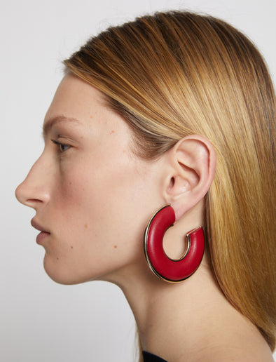 Image of model wearing LEATHER HOOP EARRINGS - FLAME RED