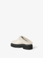 Back 3/4 image of Shearling Lug Sole Mules in WHITE
