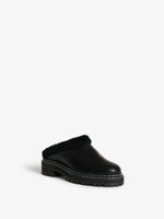 Front 3/4 image of Shearling Lug Sole Mules in Black
