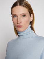 Proenza Schouler Front cropped image of model wearing Silk Cashmere Turtleneck in Light Blue