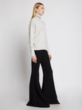 Proenza Schouler Side full length image of model wearing Silk Cashmere Turtleneck in Off White