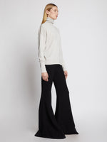 Proenza Schouler Side full length image of model wearing Silk Cashmere Turtleneck in Off White