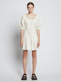 Front full length image of model wearing Cotton Linen Mini Dress in OFF WHITE