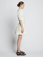 Side full length image of model wearing Cotton Linen Mini Dress in OFF WHITE