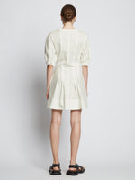 Back full length image of model wearing Cotton Linen Mini Dress in OFF WHITE