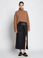 Front full length image of model wearing Doubleface Eco Cashmere Oversized Turtleneck Sweater in SADDLE