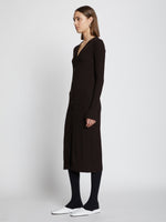Side image of model wearing Micro Stripe Rib Knit Dress in black