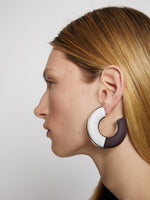 Image of model wearing LEATHER HOOP EARRINGS - WHITE/CHOCOLATE PLUM